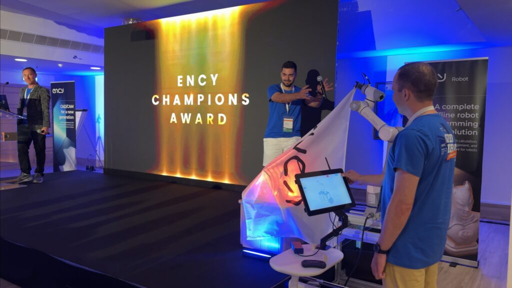 A team prepares for the ENCY Champions Award presentation.