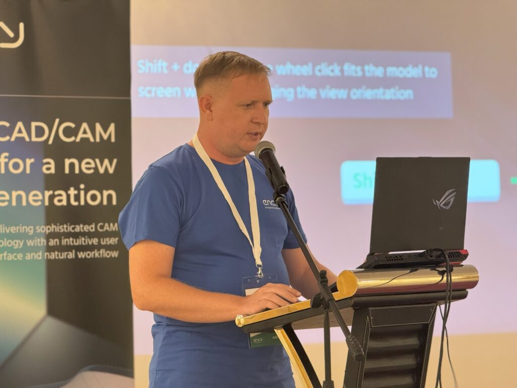 A speaker presents a new project at a conference event.