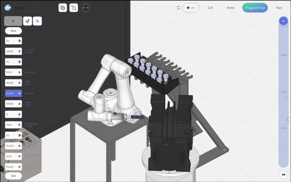 A robotic arm assembles components on a workstation.