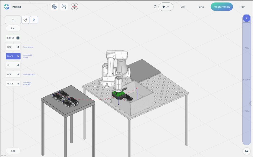A robotic arm is preparing to pack items on a tabletop.
