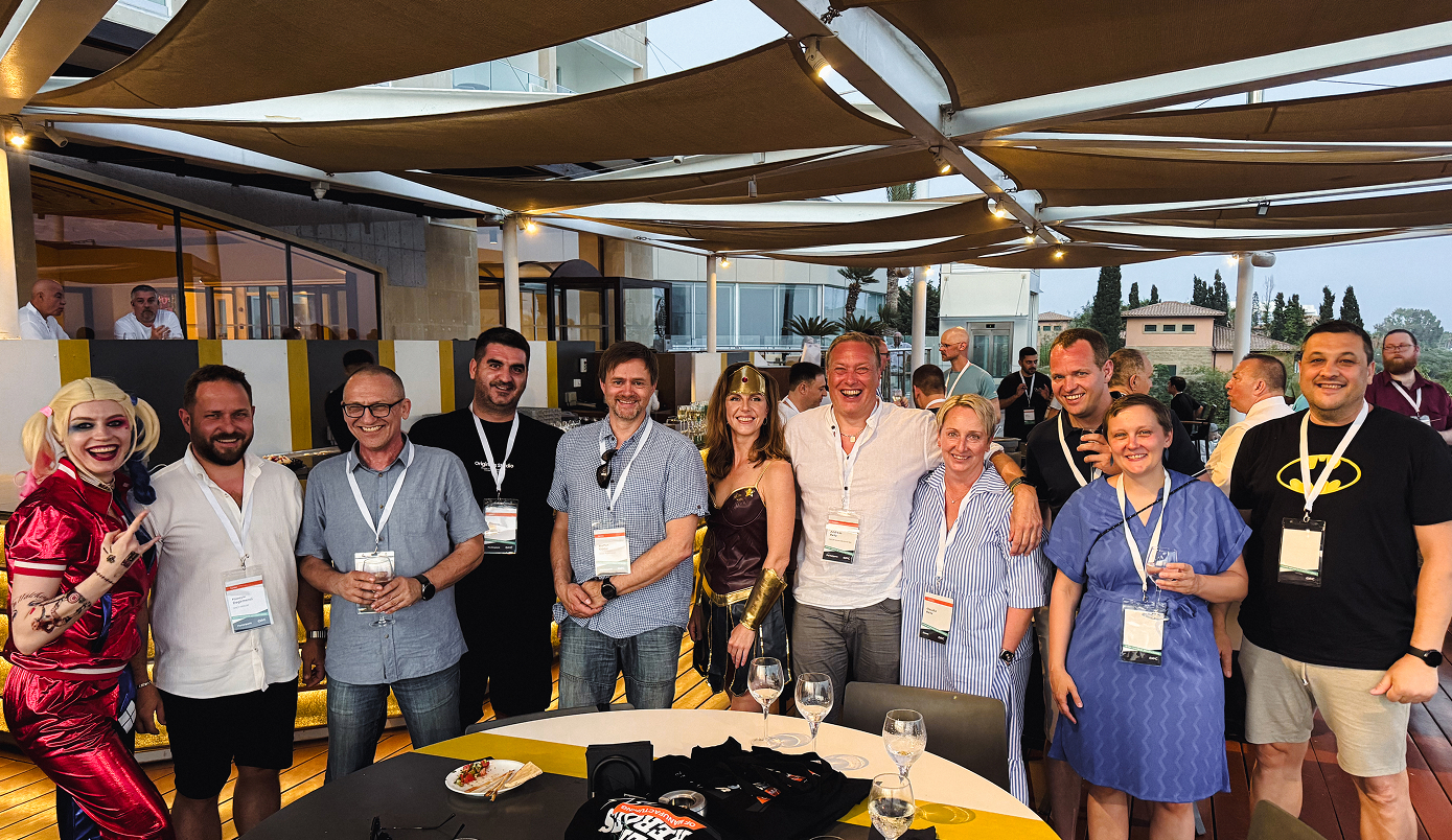 A group of professionals gathers for networking on Day 1 of the event.