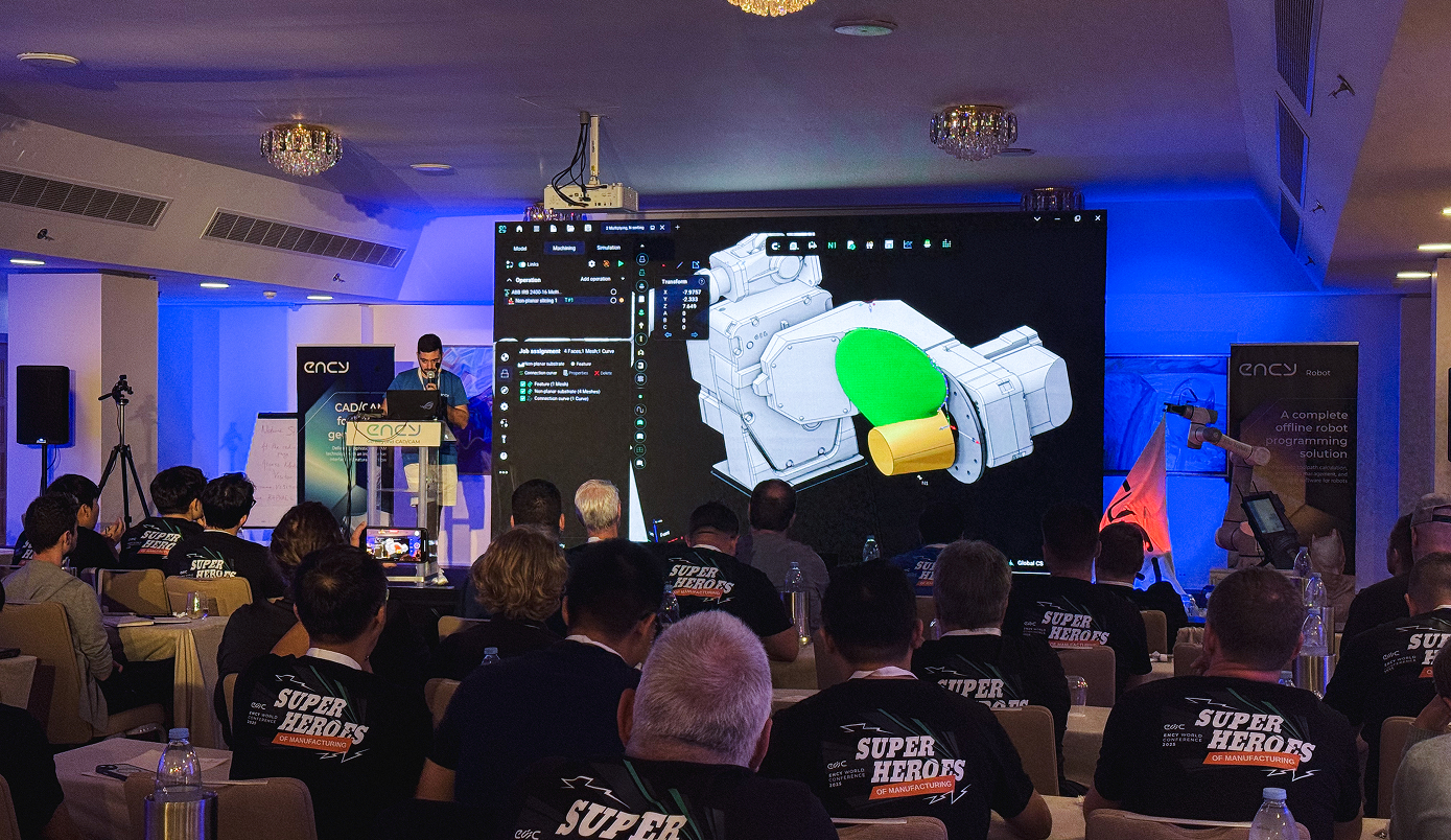 A presenter demonstrates 3D modeling software to an audience.