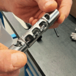 Dino Paoli uses ENCY to machine complex Hurricane wheel gun components for Formula 1