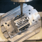 Dino Paoli uses ENCY to machine complex Hurricane wheel gun components for Formula 1