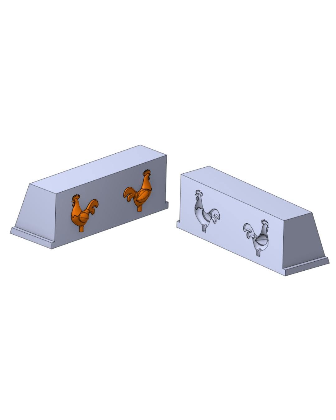 Two CAD-rendered mold halves with rooster reliefs, one positive and one cavity side