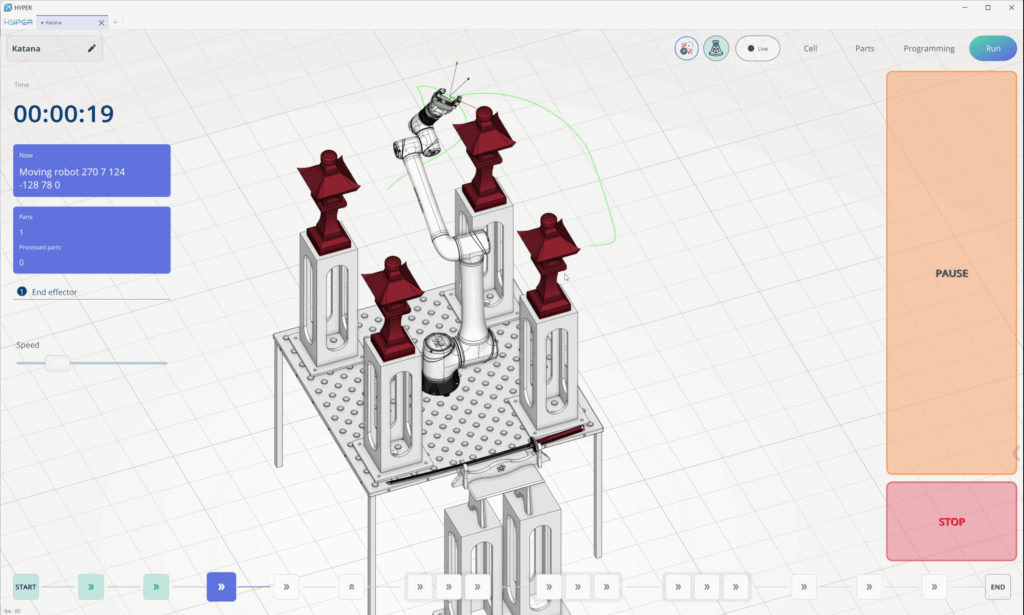 Robotic cell built in MachineMaker with a six-axis cobot and workpieces on a perforated table inside ENCY Hyper