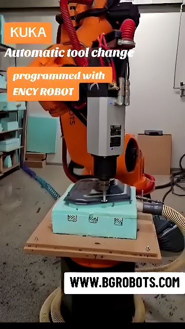 KUKA six-axis industrial robot milling a foam block with spindle and dust extraction