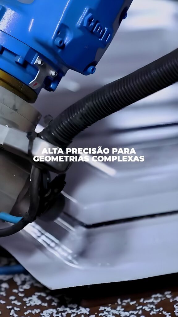 Blue CNC robotic milling spindle cutting an aluminum workpiece, producing fine metal chips