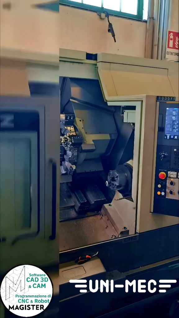 CNC turning center with open door showing spindle chuck and tool turret